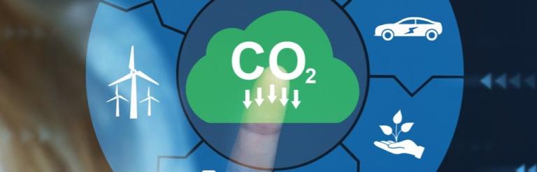 It says CO2 in the middle and illustrations for things around the outside that can reduce CO2.