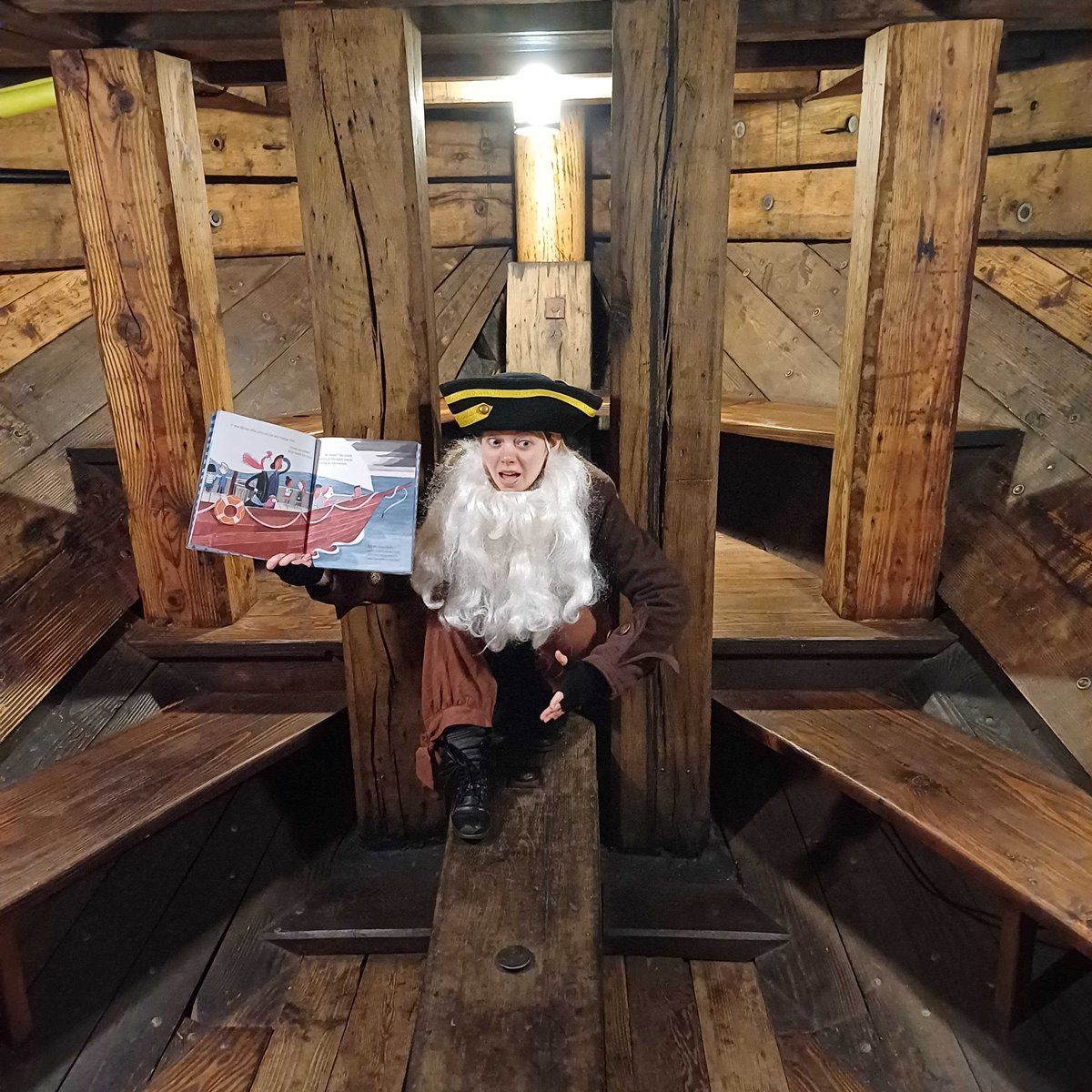 article thumb - Pirate on The Golden Hinde holding a picture book